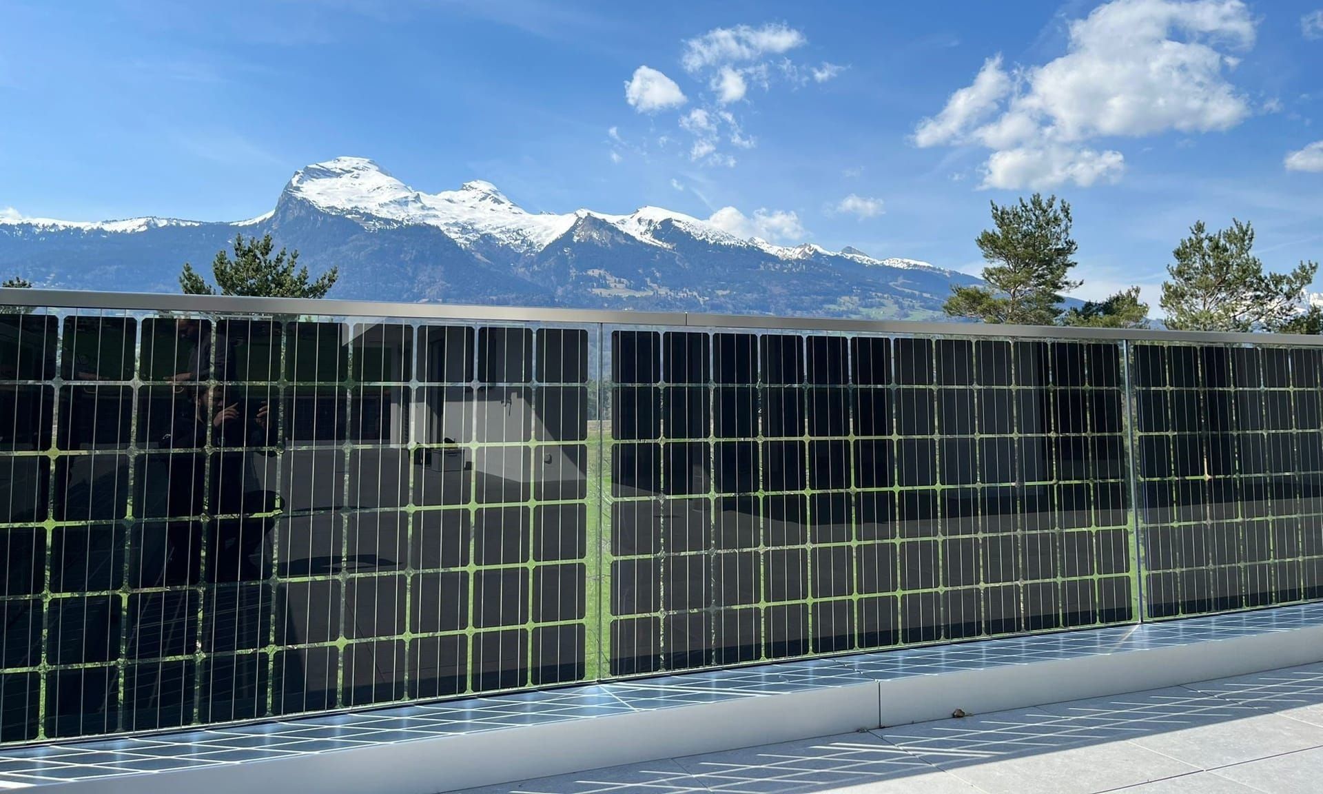 BIPV balcony railing installation with mountain view